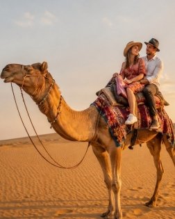 Camel ride in the desert
